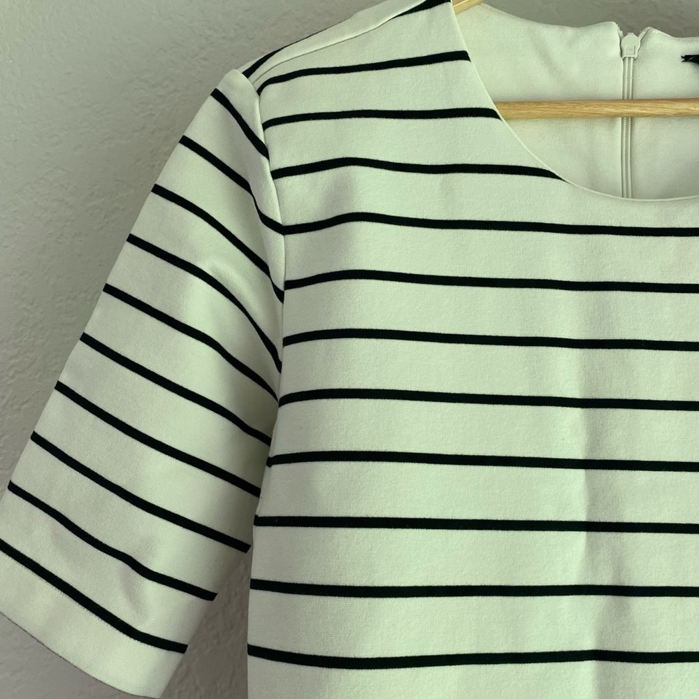 Stretch ponte tunic mini dress with slash pockets. Comfort + structure.